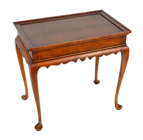 ELDRED WHEELER TIGER MAPLE "NANTUCKET" TEA TABLE Massachusetts, 20th Century Height 27". Length 28".