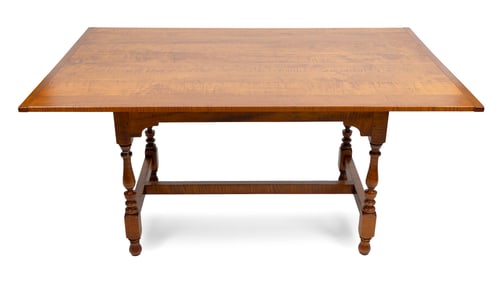 ELDRED WHEELER TIGER MAPLE TABLE Massachusetts, 20th Century Height 30". Length 62.25". Width