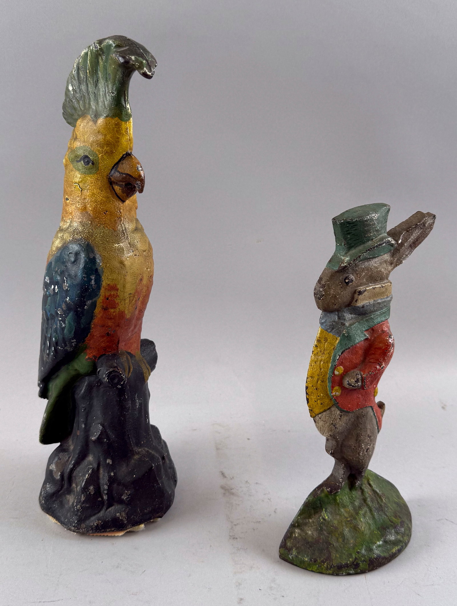 TWO CAST IRON ANIMAL DOORSTOPS Early 20th Century Heights 10" and 14". (1 of 3)