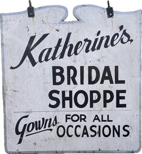 "KATHERINE'S BRIDAL SHOPPE" SIGN America, 20th Century Height 32". Width 30".: "KATHERINE'S BRIDAL SHOPPE" SIGNAmerica, 20th CenturyDouble-sided. "Katherine's Bridal Shoppe Gowns for All Occasions" in black lettering against a white ground.Height 32". Width 30".