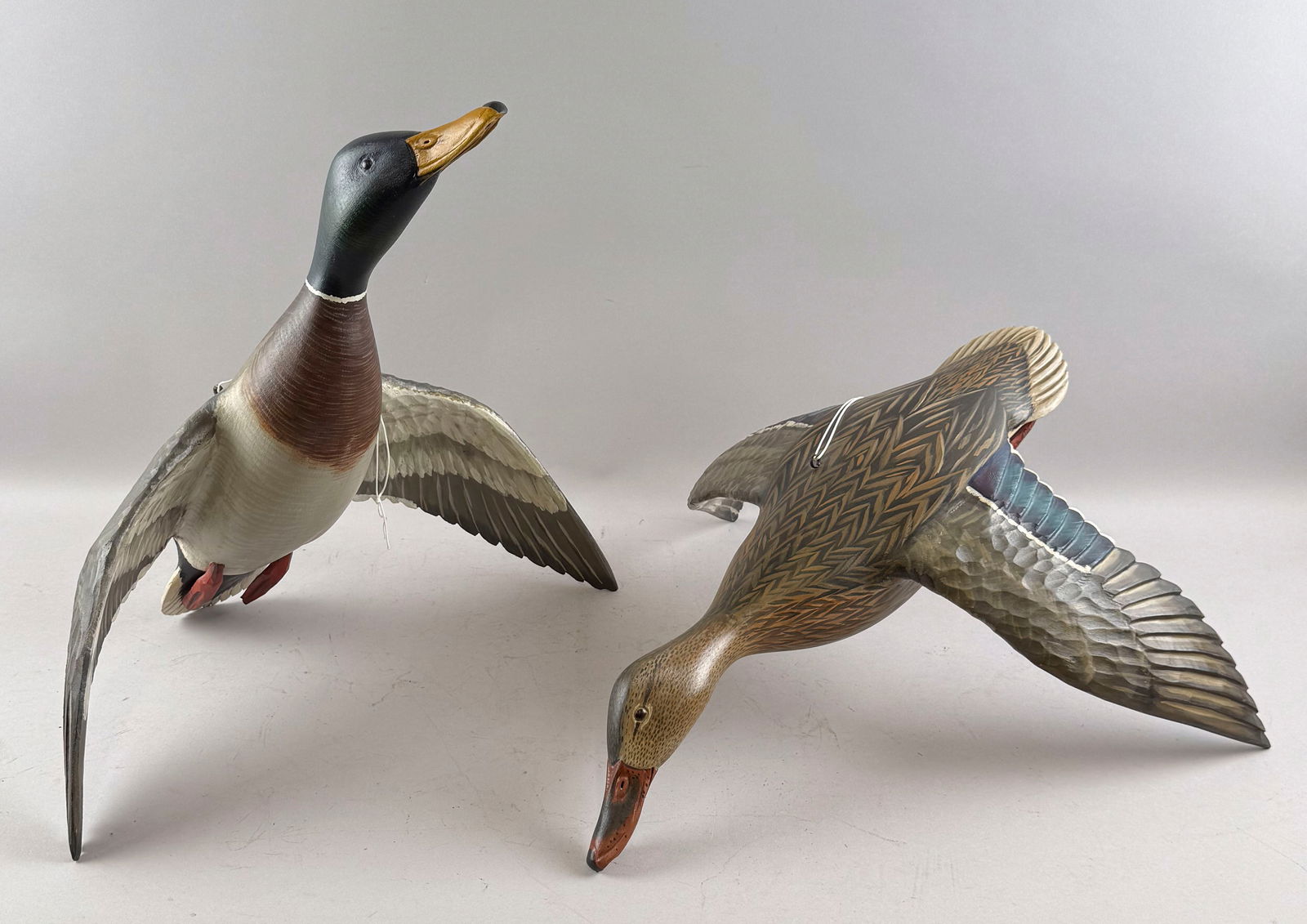 PAIR OF MIKE BORRETT CARVED WOODEN MALLARDS Wisconsin, Contemporary Lengths 22". Wing spans 19". (1 of 6)