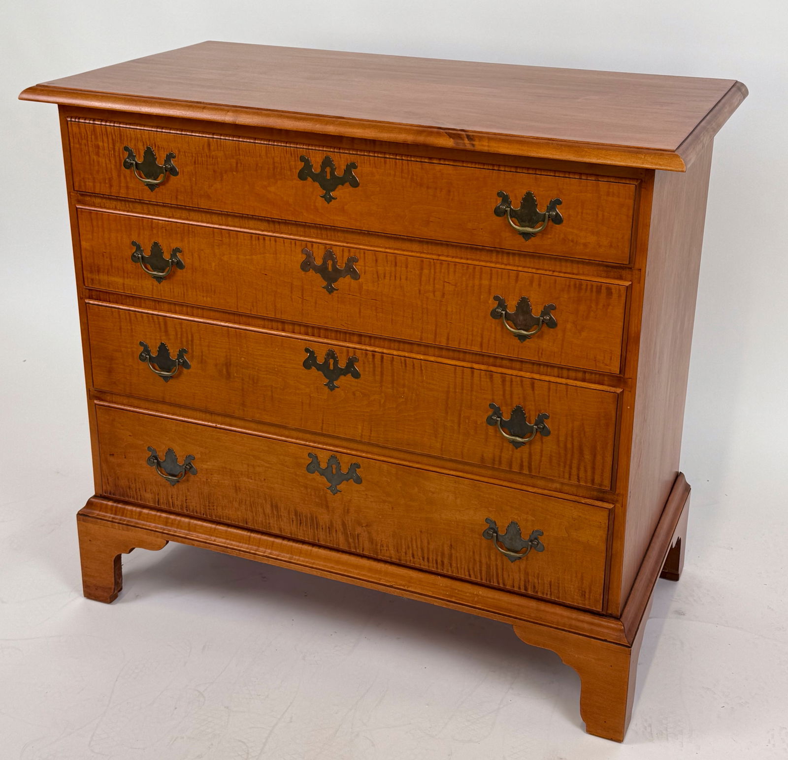 ELDRED WHEELER TIGER MAPLE BUREAU Massachusetts, 20th Century Height 33". Width 36". Depth 19". (1 of 5)