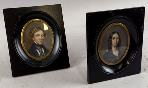 PAIR OF MINIATURE PORTRAITS 19th Century Watercolors on paper, 2.5" x 2.25". Framed 5.25" x 4.5".