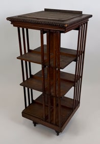 REVOLVING BOOKCASE Early 20th Century Height 46". Width 22". Depth 22".