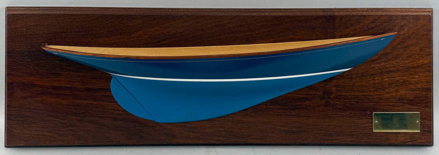 MOUNTED HALF HULL MODEL OF A NEW YORK 32 America, 20th Century Backboard 8.5" x 28".: MOUNTED HALF HULL MODEL OF A NEW YORK 32America, 20th CenturyBy Marsom Buttfield Pratt (1923-2009). Signed verso.Backboard 8.5" x 28".