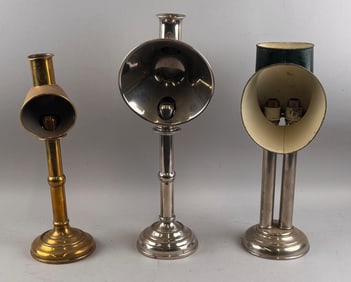 THREE EJECTOR LANTERNS Late 19th Century Heights from 14.5" to 17.5".