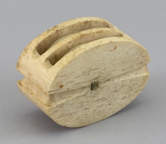 WHALEBONE DOUBLE SHEAVE BLOCK 19th Century Length 4". Width 3". Depth 1.875".