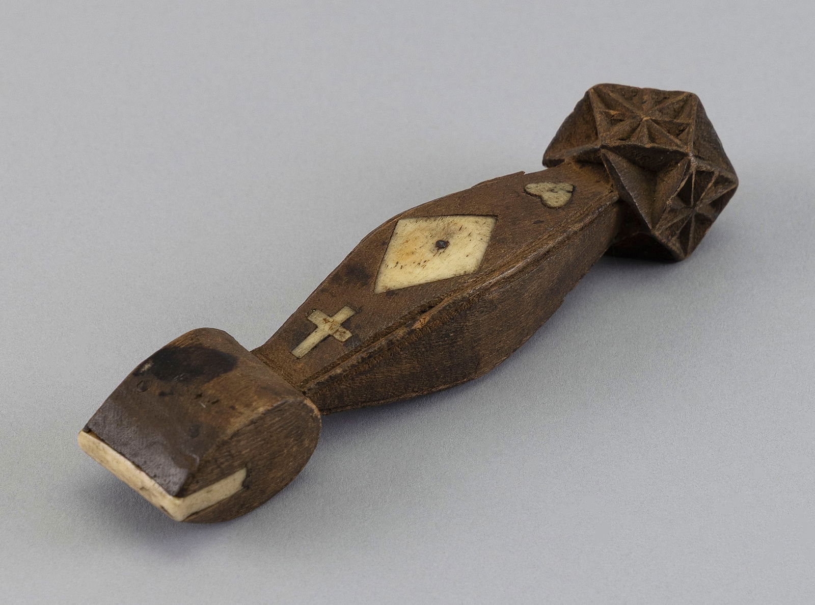 CARVED WOOD, WHALEBONE AND WHALE IVORY SEAM RUBBER 19th Century Length 5.75".: CARVED WOOD, WHALEBONE AND WHALE IVORY SEAM RUBBER19th CenturyCarved "David Pickard" on one side of shaft. Inlaid with a heart, diamond and cross.Length 5.75". Provenance:Private Collection, Maine.