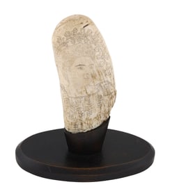 SCRIMSHAW WHALE'S TOOTH WITH STIPPLED DECORATION AND "FAYAL HORTA", Circa 1909 Total height 8.25".