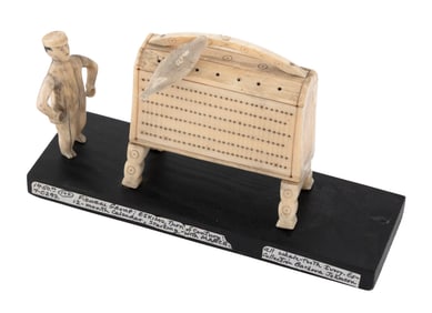 UNUSUAL ESKIMO CALENDAR OR COUNTER Late 19th/Early 20th Century Height 4.75". Length 7.75".