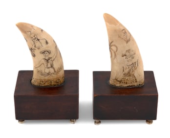 PAIR OF SCRIMSHAW WHALE'S TEETH Mid-19th Century Tooth lengths 5.25". Total heights 8".