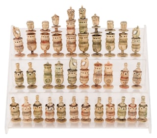 CARVED BONE CHESS SET Early 19th Century Heights from approx. 3" to 6".