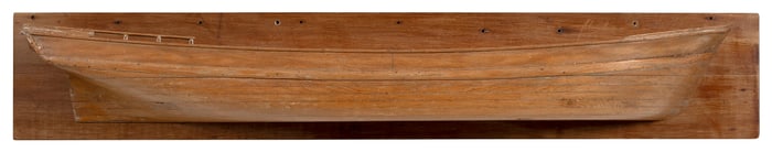 MOUNTED HALF HULL MODEL OF A SAILING VESSEL America, Mid-19th Century Backboard 9.5" x 53.5".