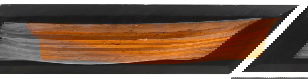 MOUNTED BUILDER'S HALF HULL MODEL 19th Century Backboard 8.75" x 35.5".: MOUNTED BUILDER'S HALF HULL MODEL19th CenturyBuilt up in 12 lifts.Backboard 8.75" x 35.5".Provenance:Deaccessioned by the Old Dartmouth Historical Society, New Bedford, Massachusetts. Proceeds to bene