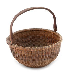 WILLIAM D. APPLETON NANTUCKET LIGHTSHIP BASKET Nantucket, Massachusetts, Late 19th/Early 20th: WILLIAM D. APPLETON NANTUCKET LIGHTSHIP BASKETNantucket, Massachusetts, Late 19th/Early 20th CenturyRound, with a swing handle. As typical in Appleton baskets, the inner part of handle where it meets