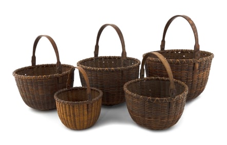 NEST OF FIVE NANTUCKET BASKETS Late 19th/Early 20th Century Heights to rim from 4.25" to 7.75".