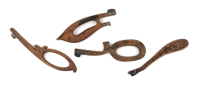 FOUR CARVED WOODEN MACKEREL PLOWS, Late 19th Century Lengths 7.75", 8", 8.5" and 9.25".