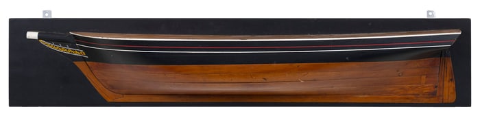 MOUNTED HALF HULL MODEL OF A SCHOONER Late 19th/Early 20th Century Backboard 7.25" x 40".