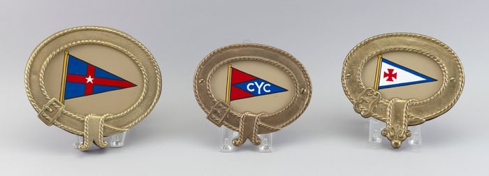 THREE BRONZE YACHT BADGES First Quarter of the 20th Century Lengths from 6" to 7.25".