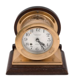 CHELSEA SHIP'S BELL CLOCK Boston, 20th Century Total height 8". Diameter of face 4".