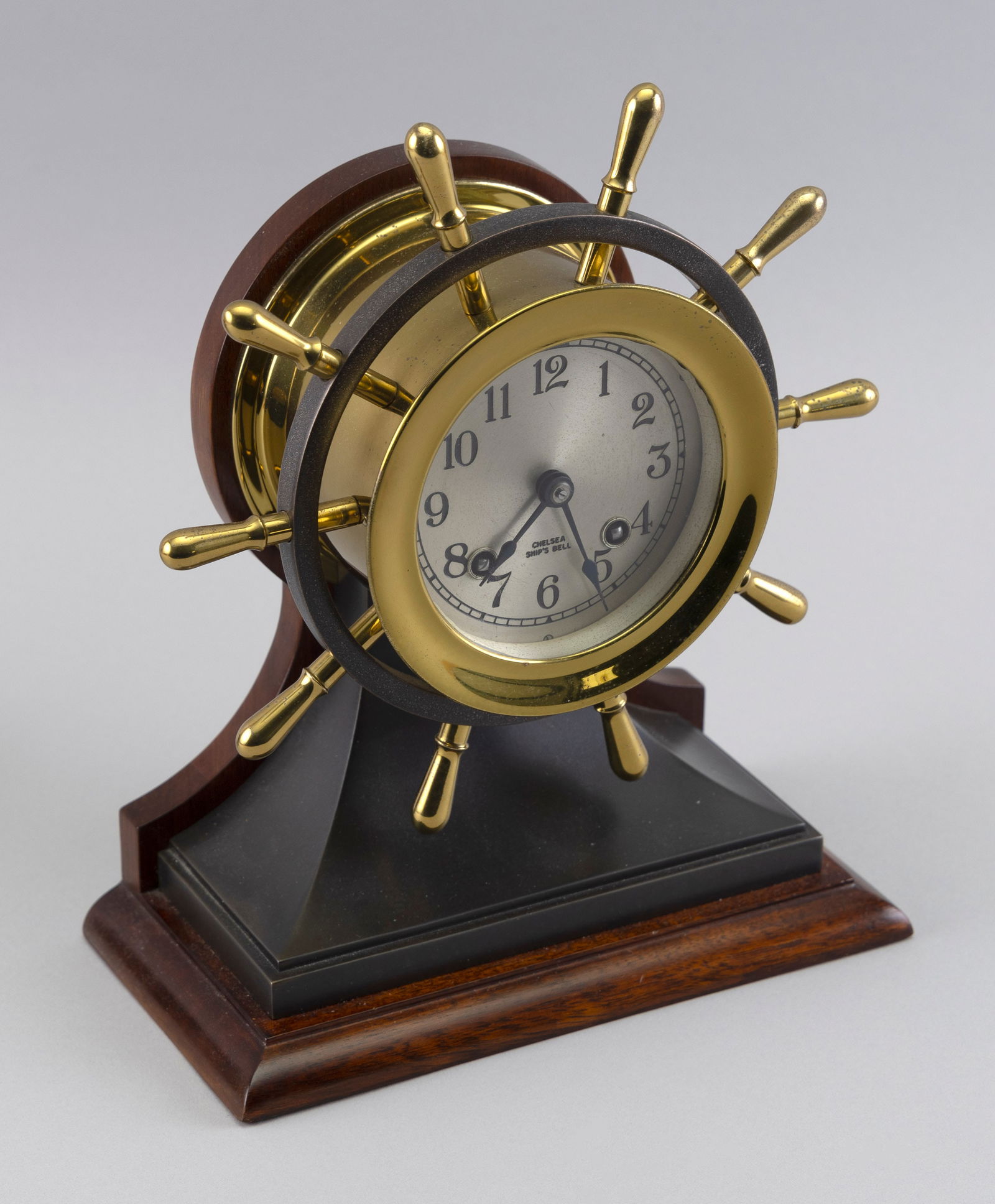CHELSEA SHIP'S WHEEL CLOCK Boston, 20th Century Total height 10.5". Diameter of face 3.5". (1 of 2)
