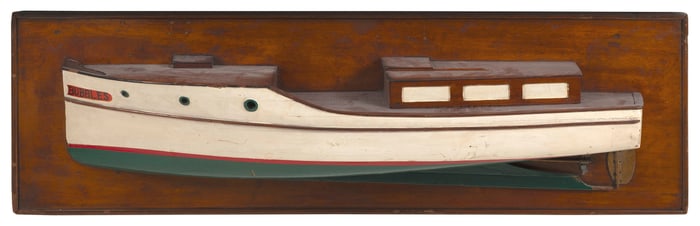 MOUNTED HALF HULL MODEL OF THE MOTOR YACHT "BUBBLES" First Half of the 20th Century Backboard 14.75"