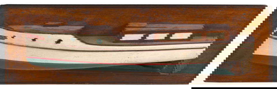 MOUNTED HALF HULL MODEL OF THE MOTOR YACHT "BUBBLES" First Half of the 20th Century Backboard 14.75": MOUNTED HALF HULL MODEL OF THE MOTOR YACHT "BUBBLES"First Half of the 20th CenturyWhite hull with red boot and green bottom.Backboard 14.75" x 32.25".