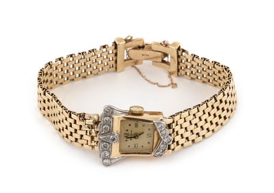 BULOVA 14KT YELLOW GOLD AND DIAMOND WATCH Approx. 19.7 total dwt.