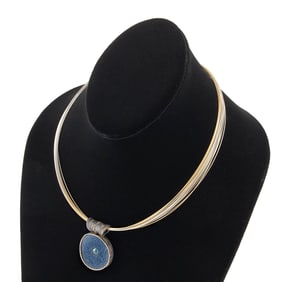 ROSS COPPELMAN STERLING SILVER, 18KT AND 22KT GOLD PENDANT Approx. 15.8 total dwt.