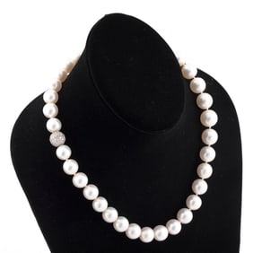 PLATINUM, DIAMOND AND SOUTH SEA CULTURED PEARL NECKLACE
