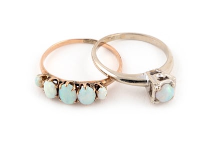 TWO 14KT GOLD AND OPAL RINGS Approx. 2.31 total dwt.