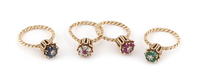 FOUR 14KT YELLOW GOLD AND DIAMOND TULIP RINGS Approx. 9.5 total dwt.