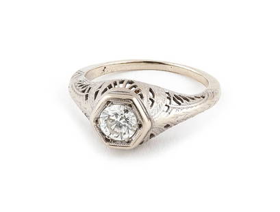 14KT WHITE GOLD AND DIAMOND RING Approx. 1.80 total dwt.: 14KT WHITE GOLD AND DIAMOND RINGOne approx. 0.50 ct. diamond, approx. VS1 clarity, H-I color. Filigree-style mounting. Size 5.Approx. 1.80 total dwt.