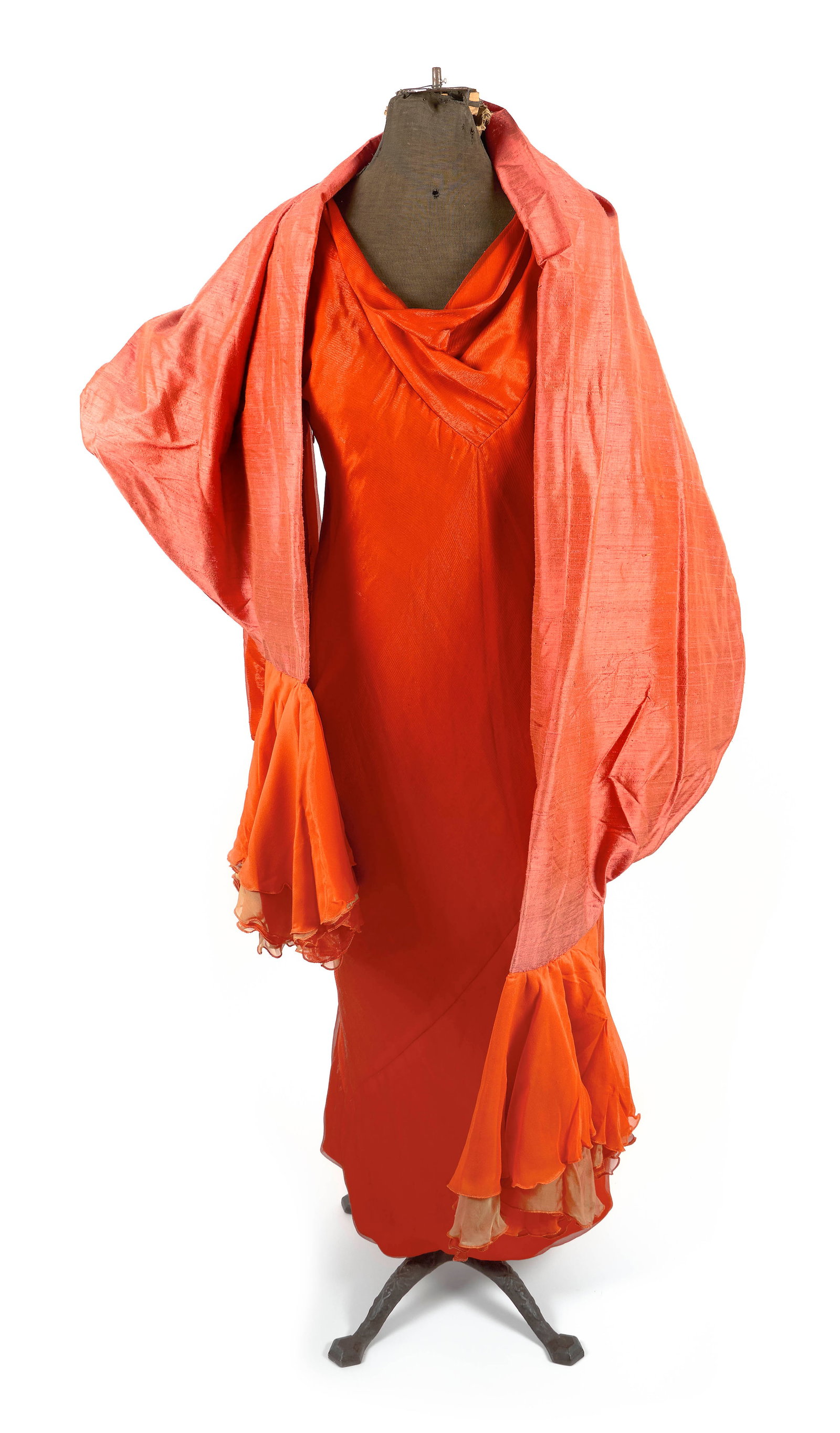 BRIGHT ORANGE DRESS WITH ELABORATE SHAWL: BRIGHT ORANGE DRESS WITH ELABORATE SHAWL 1) Dress with a cowl neck and full length sleeves. Body with an interesting pattern construction with an added seam from the left hip to the right ankle. Sheer
