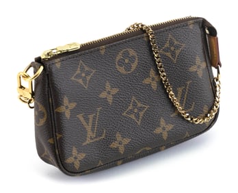 LOUIS VUITTON MINI POCHETTE France, 2015 Height 4". Length 6".