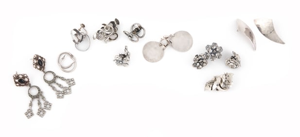 ELEVEN PAIRS OF STERLING SILVER EARRINGS Approx. 42.6 total dwt.
