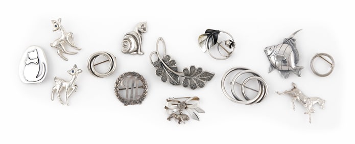 THIRTEEN STERLING SILVER PINS Approx. 47.5 total dwt.