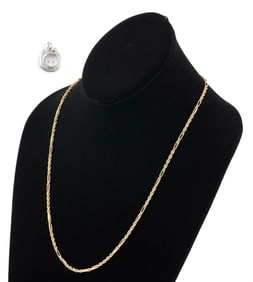 10KT GOLD CHAIN AND PENDANT Approx. 10.6 total dwt.
