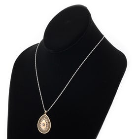 14KT GOLD CHAIN AND PENDANT Approx. 7.7 total dwt.