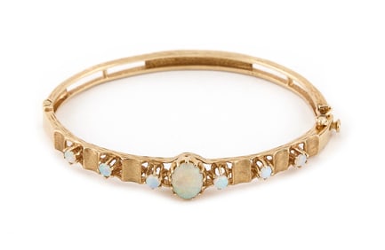 14KT YELLOW GOLD AND OPAL BANGLE BRACELET Approx. 9.4 total dwt.