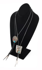 TWO NAVAJO OLD PAWN SILVER, CLAW AND HARDSTONE BOLO TIES Early to Mid-20th Century 2" x 1.5" and