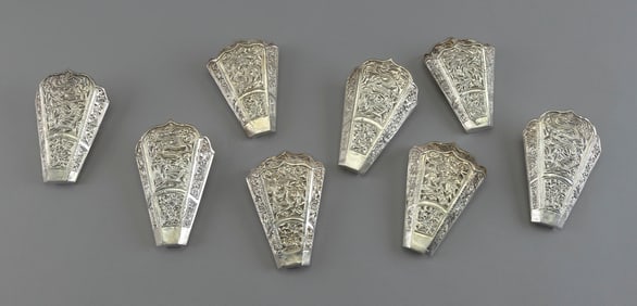 EIGHT PERANAKAN SILVER SIRIH (BETEL) LEAF HOLDERS Southeast Asia, Early 20th Century Approx. 12.6