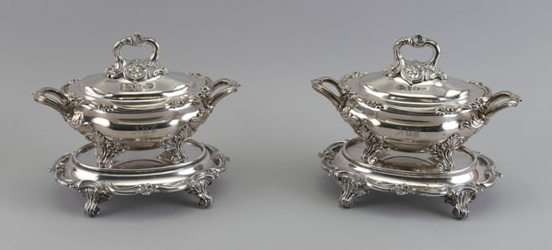 PAIR OF SILVER PLATED COVERED TUREENS WITH FOOTED UNDERPLATES Late 19th/Early 20th Century Assembled