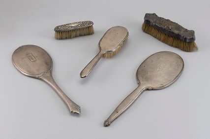 FIVE STERLING SILVER VANITY ITEMS Early to Mid-20th Century