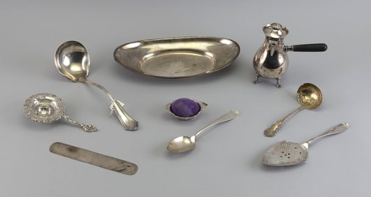 NINE PIECES OF STERLING SILVER Early to Mid-20th Century Approx. 32.4 troy oz. inclusive