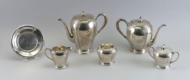"LOTUS" STERLING SILVER SIX-PIECE TEA SET Mid-20th Century Approx. 61.4 troy oz.
