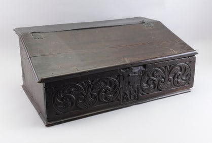 CONTINENTAL RELIEF-CARVED OAK WRITING SLANT Early 18th Century Height 11.25". Width 27.75". Depth