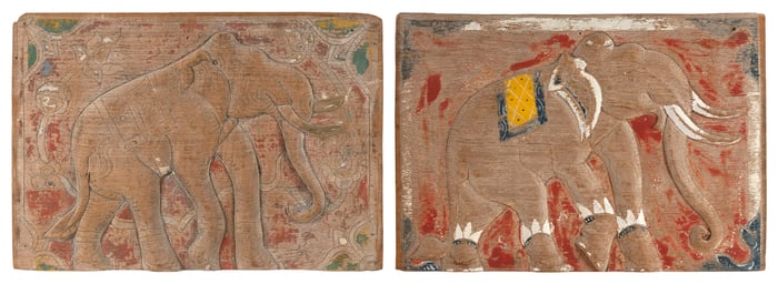 PAIR OF RELIEF-CARVED PLAQUES DEPICTING ELEPHANTS Early 20th Century 11.75" x 17". Depths approx.