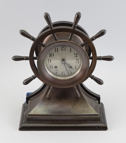 CHELSEA-STYLE SHIP'S WHEEL CLOCK First Half of the 20th Century Total height 13.5". Width 10.25".