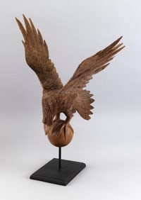 CARVED WOODEN EAGLE ON BALL Late 20th Century Total height 25".